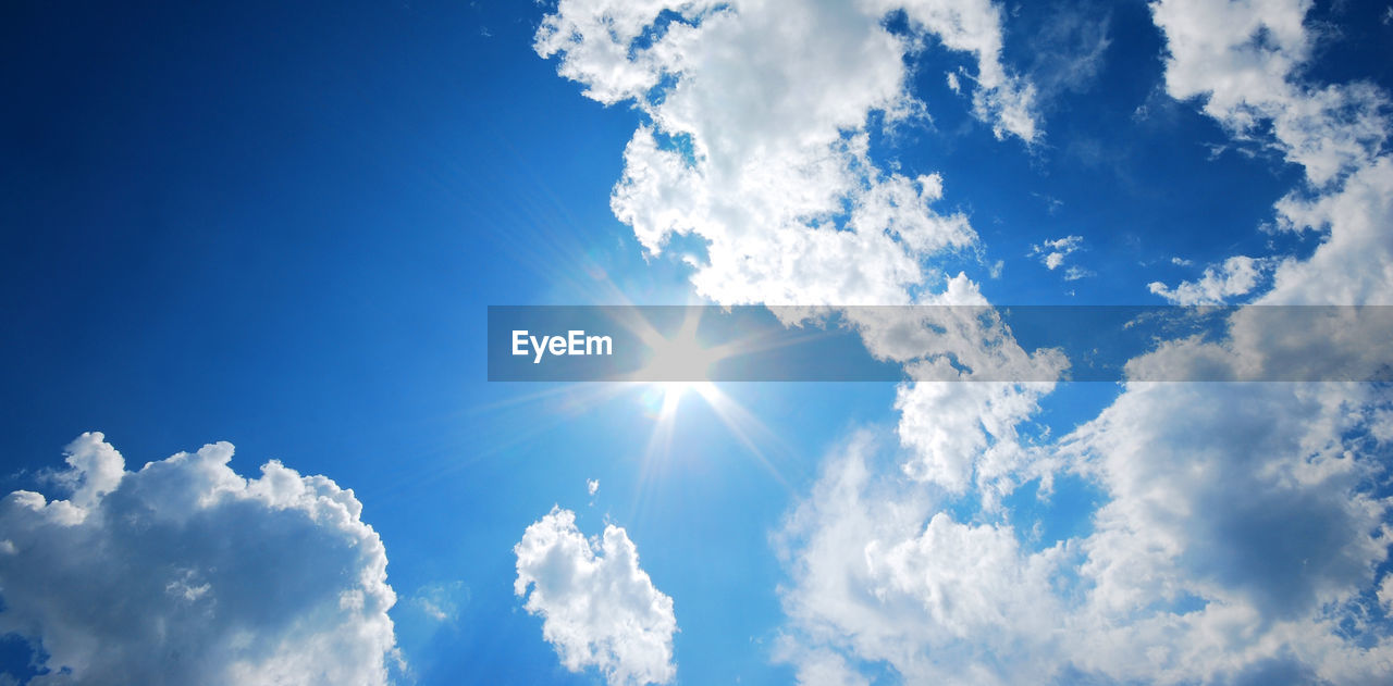 Low angle view of cloudscape on sunny day