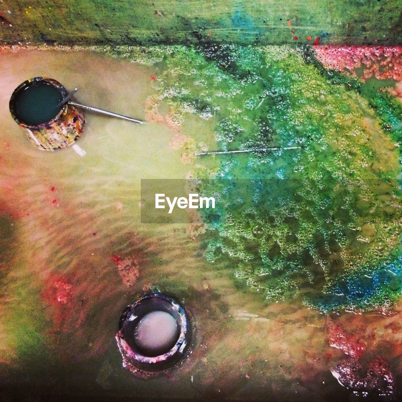 Overhead view of paint down the drain