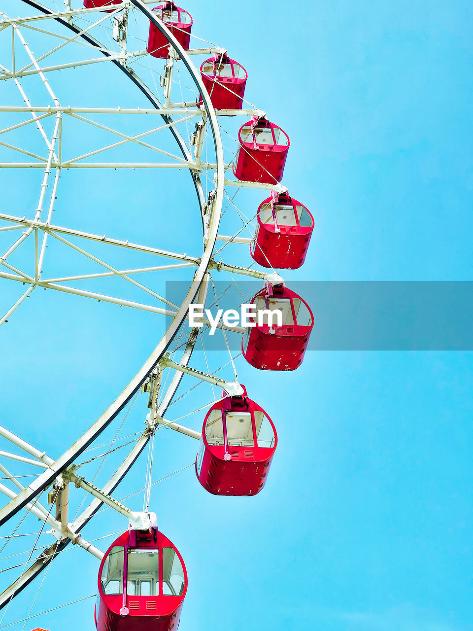 low angle view of ferris wheel against sky