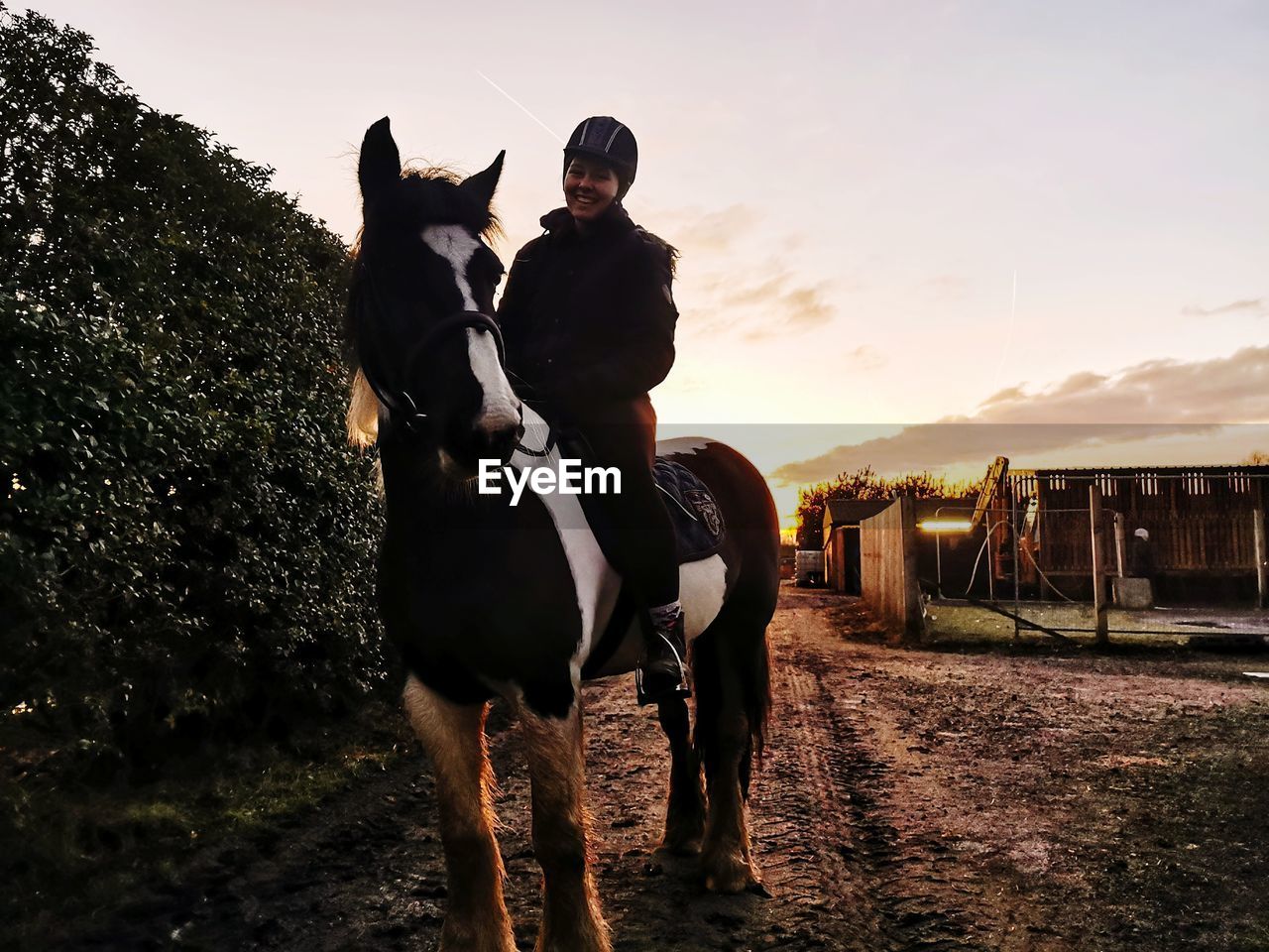 MAN RIDING HORSE