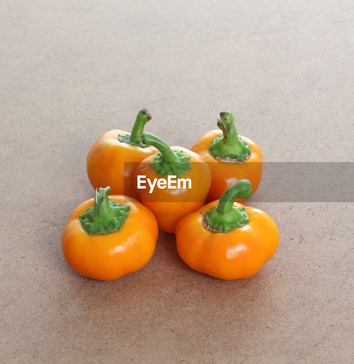 Close-up of yellow bell peppers on table