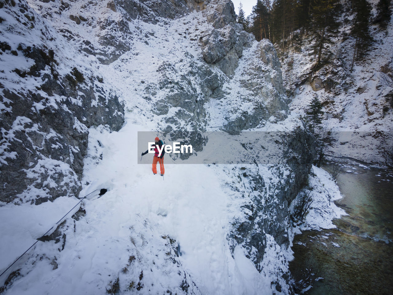 High angle view of person skiing on snowcapped mountain