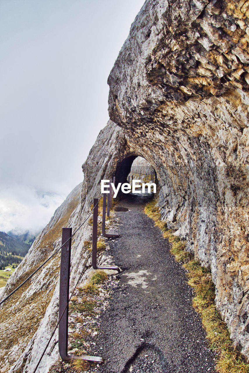 OLD STONE WALL AGAINST SKY