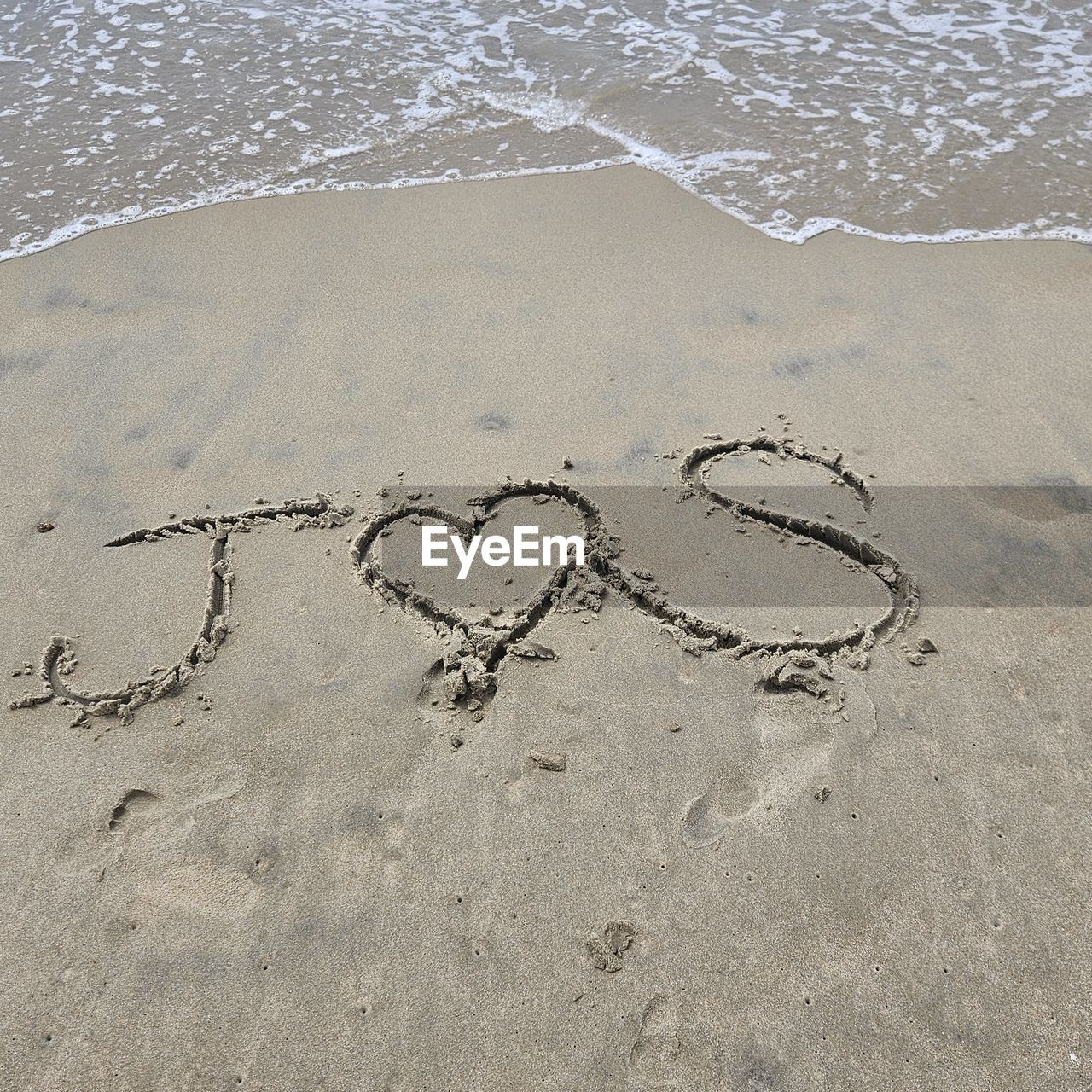 beach, sand, land, heart shape, positive emotion, no people, day, nature, creativity, text, love, handwriting, high angle view, emotion, water, drawing, communication, outdoors, western script, draw, sea, art