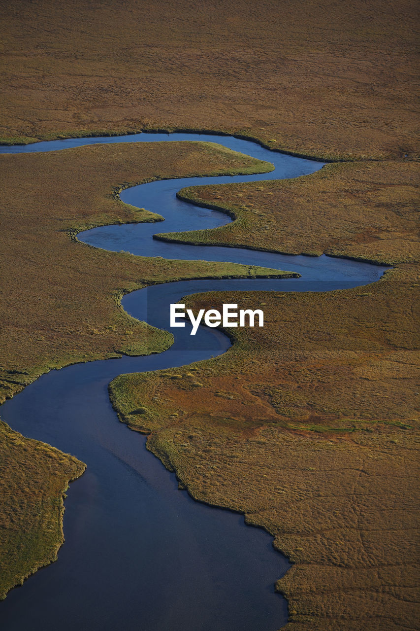 Aerial picture of meandering river in iceland