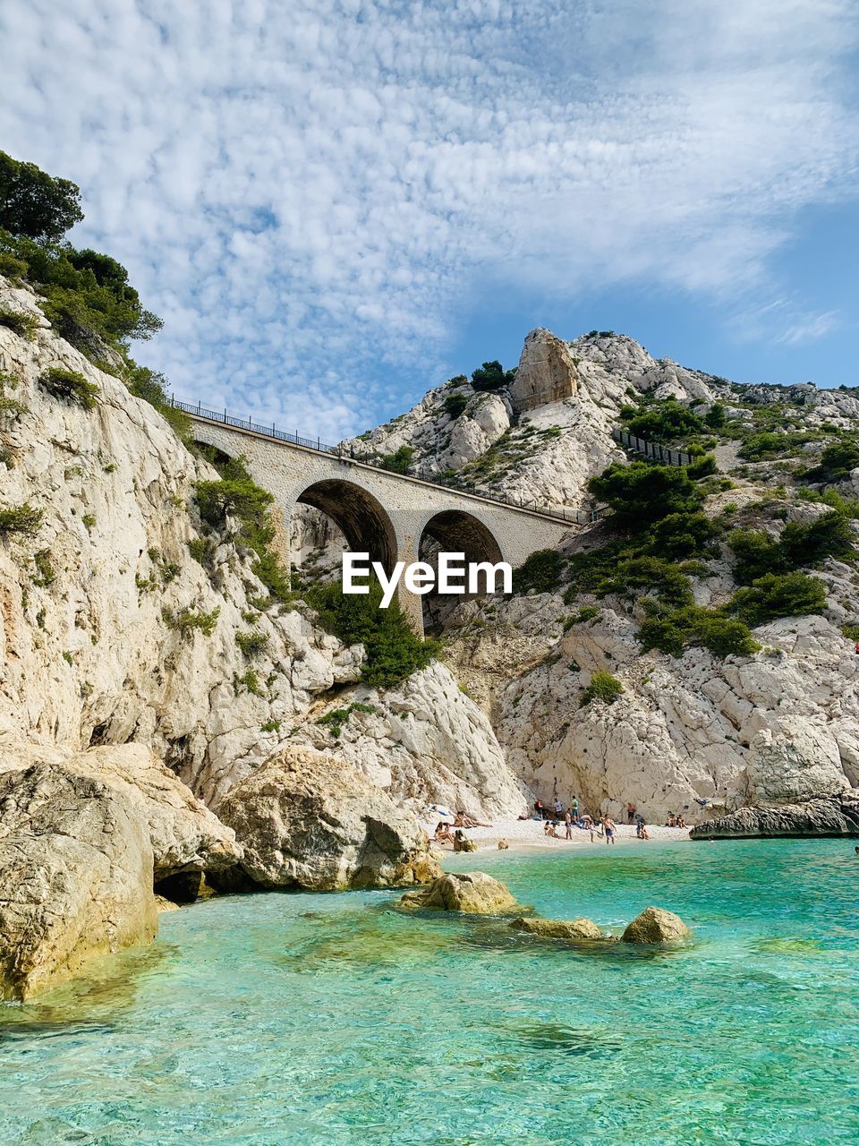 SCENIC VIEW OF SEA AGAINST ROCK FORMATION