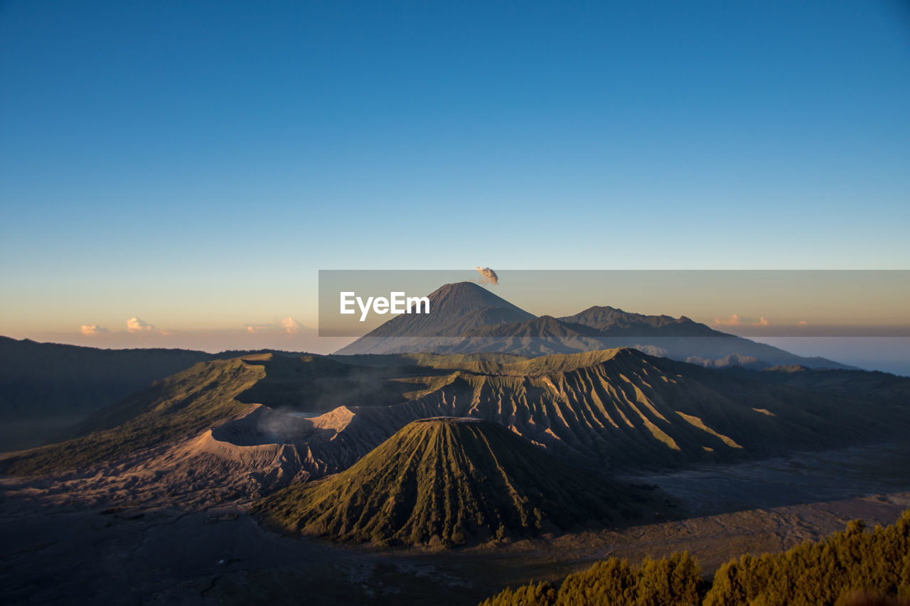 Scenic view of mountain range against clear sky