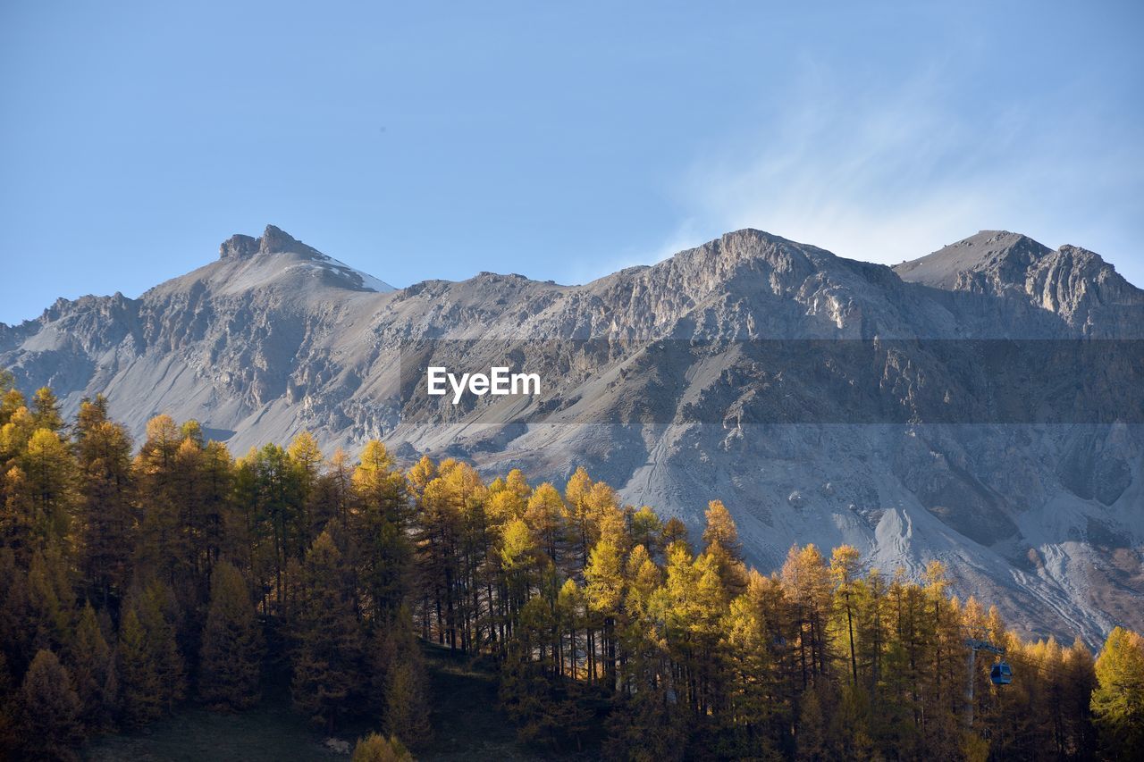 Scenic view of mountains against sky during autumn