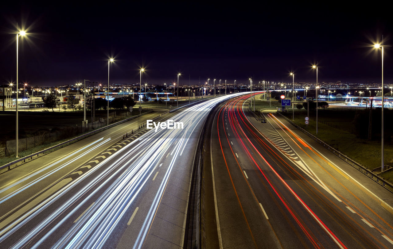 High angle view of light trails on street at night