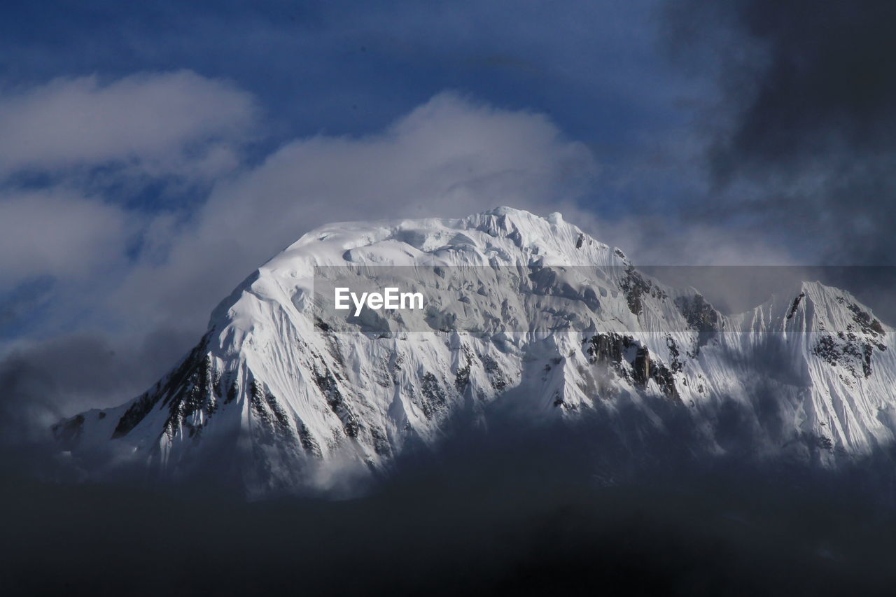 Majestic view of dhaulagiri snowcapped mountains against sky