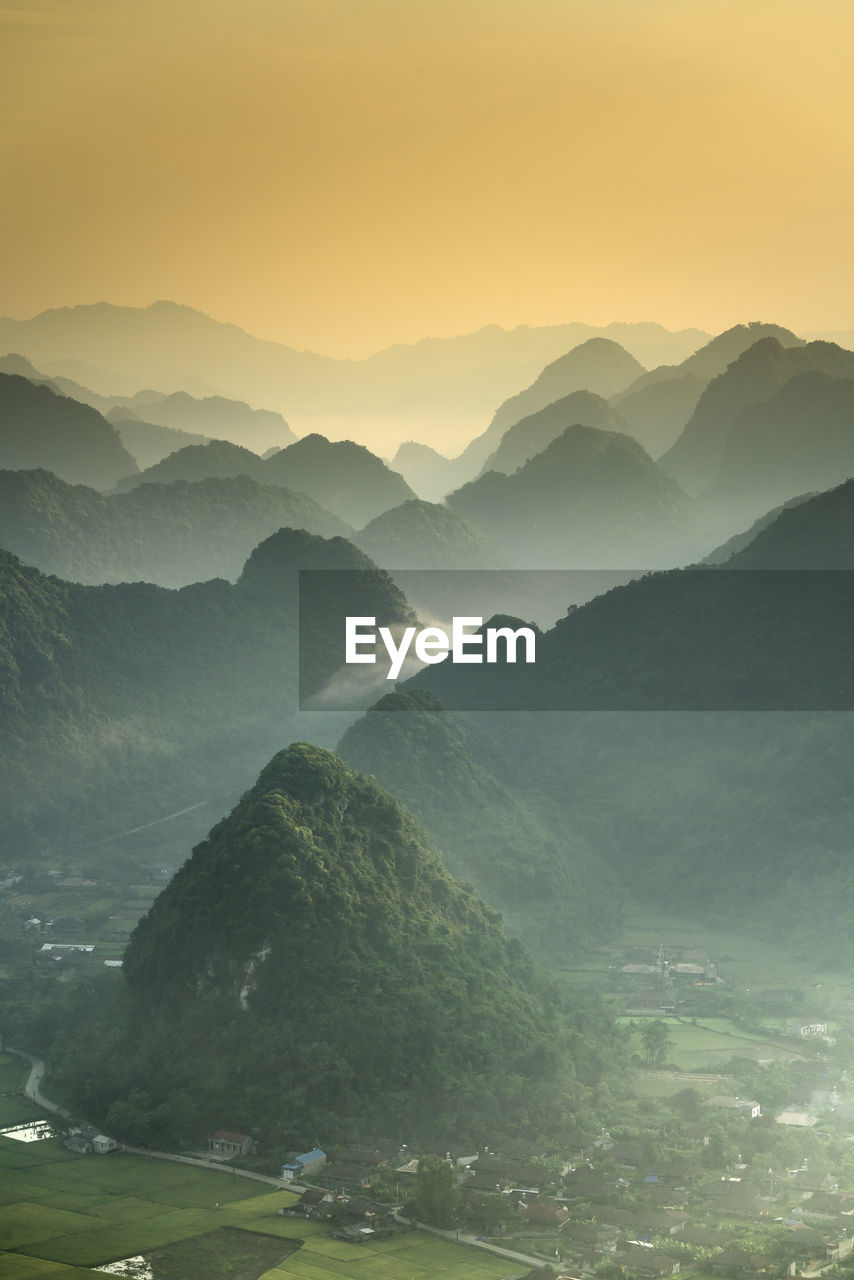 Scenic view of mountains against sky during sunset