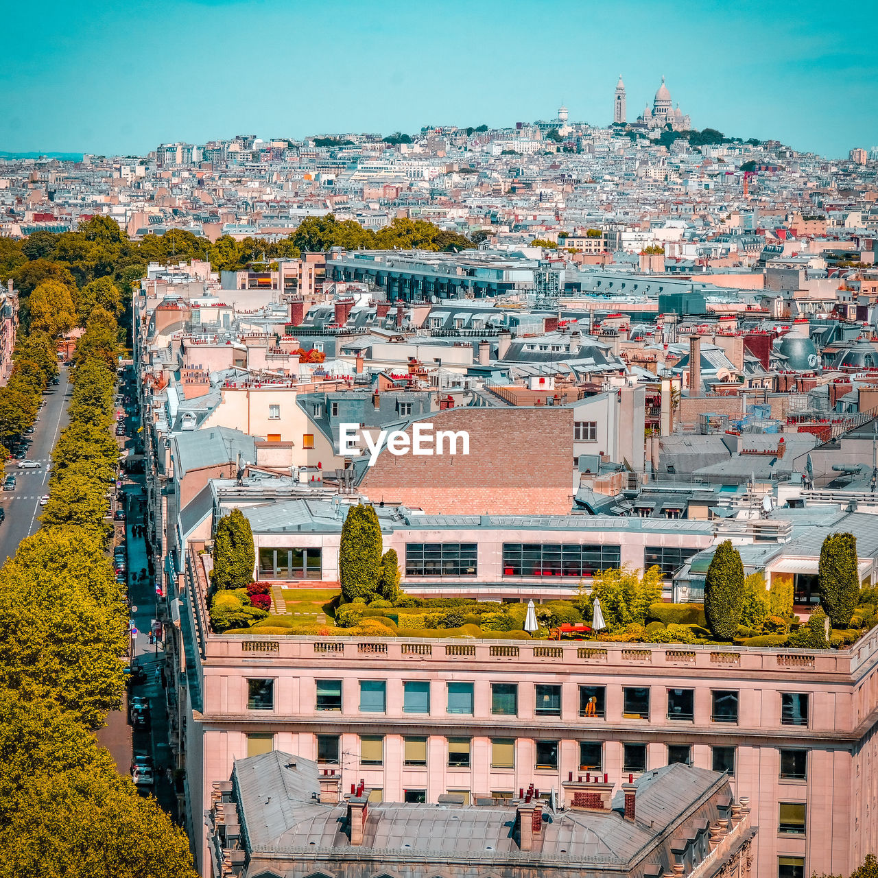 HIGH ANGLE VIEW OF BUILDINGS AGAINST SKY