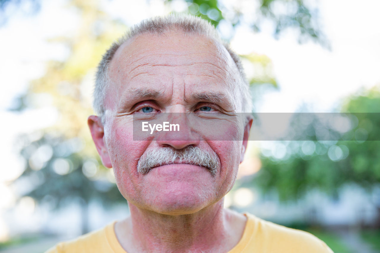 Close-up portrait of man outdoors