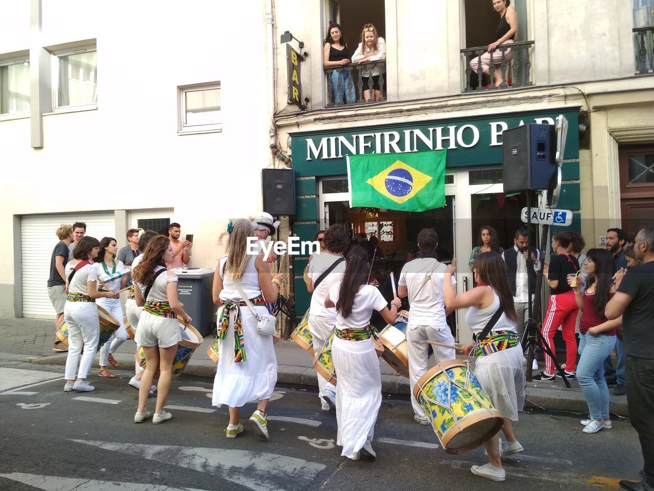 PEOPLE ON STREET IN CITY