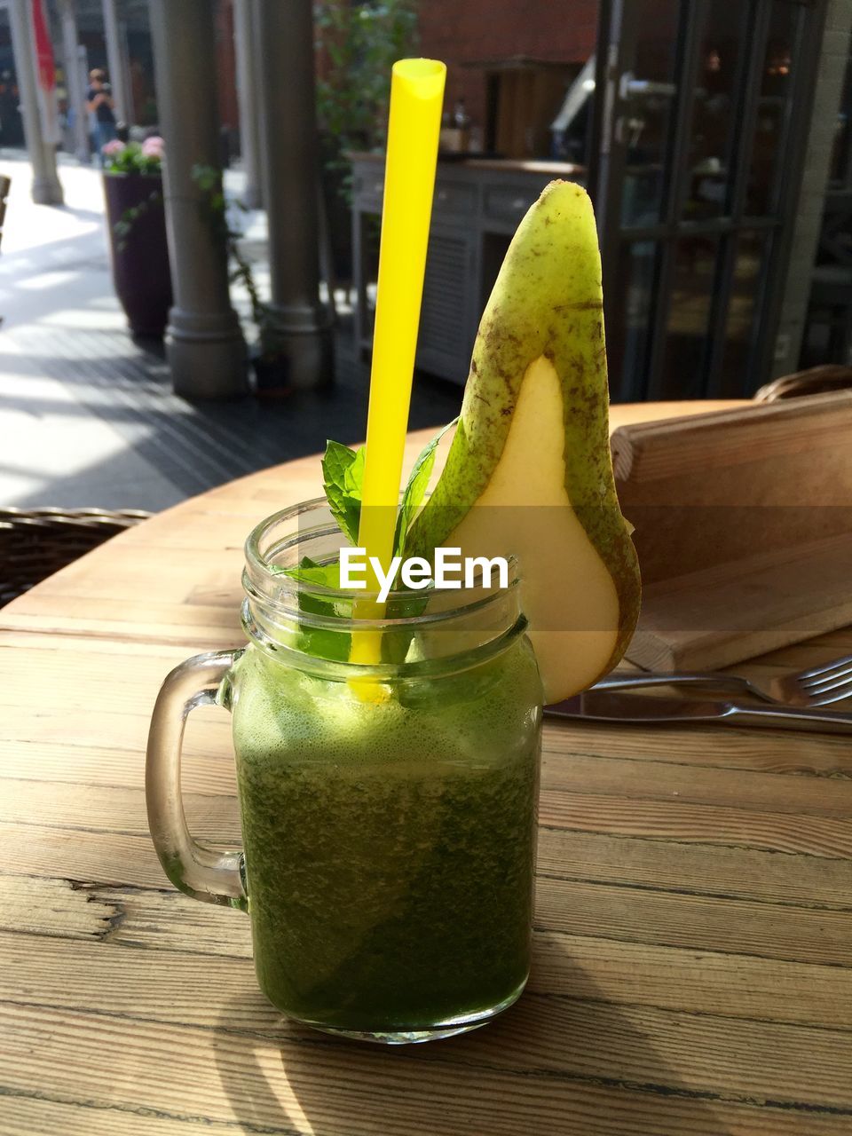 High angle view of smoothie in glass jar on table