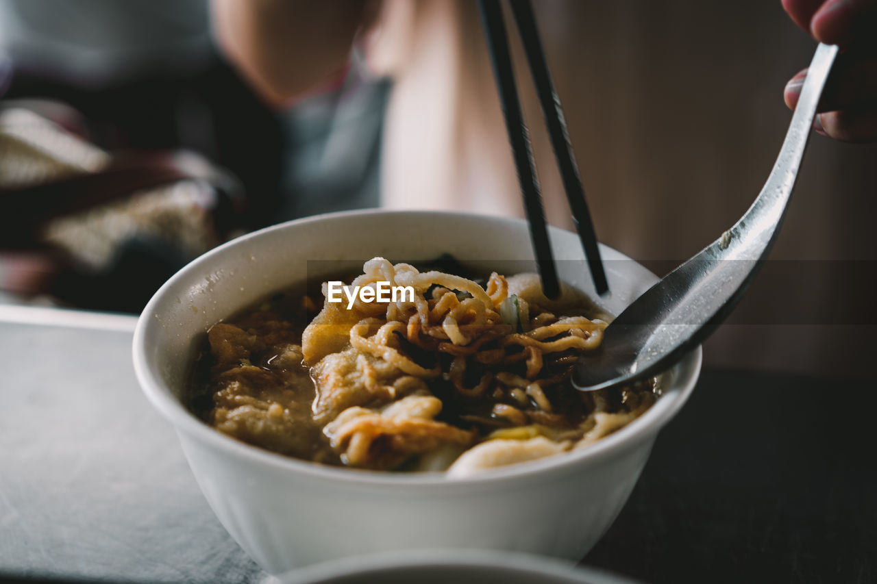 Close-up of soup in bowl on table