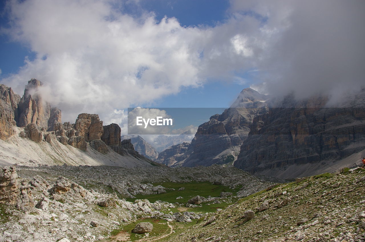 Scenic view of dolomites against sky