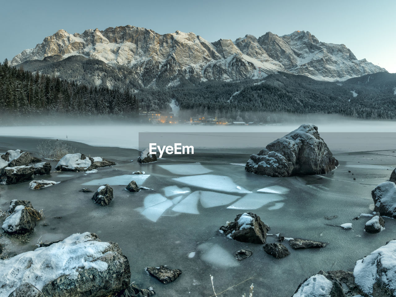 Scenic view of frozen lake against mountain