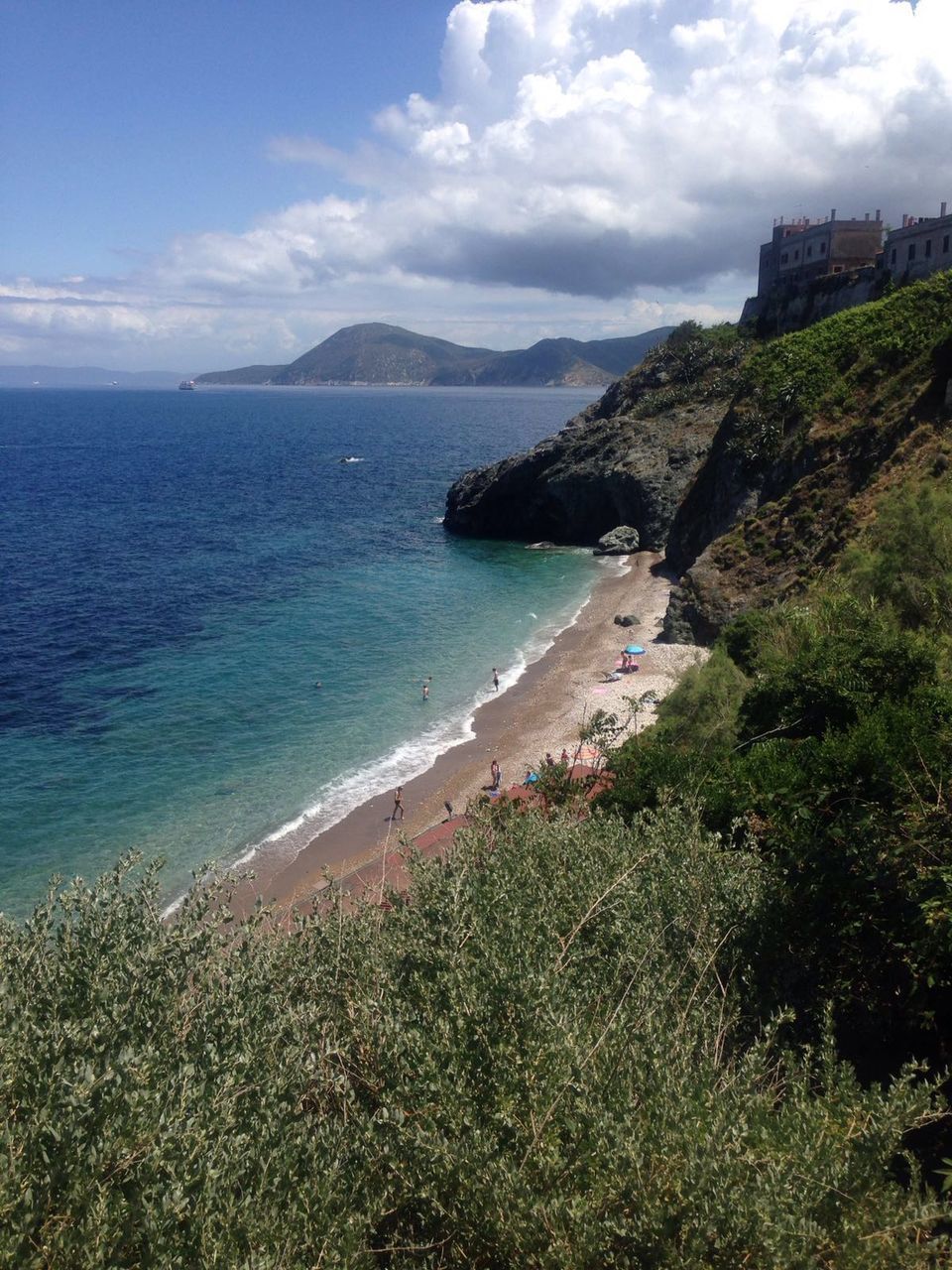 Scenic view of sea against cloudy sky