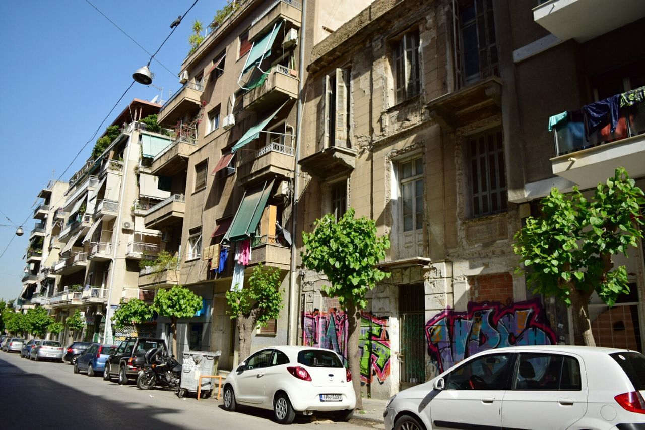 CARS ON STREET IN CITY