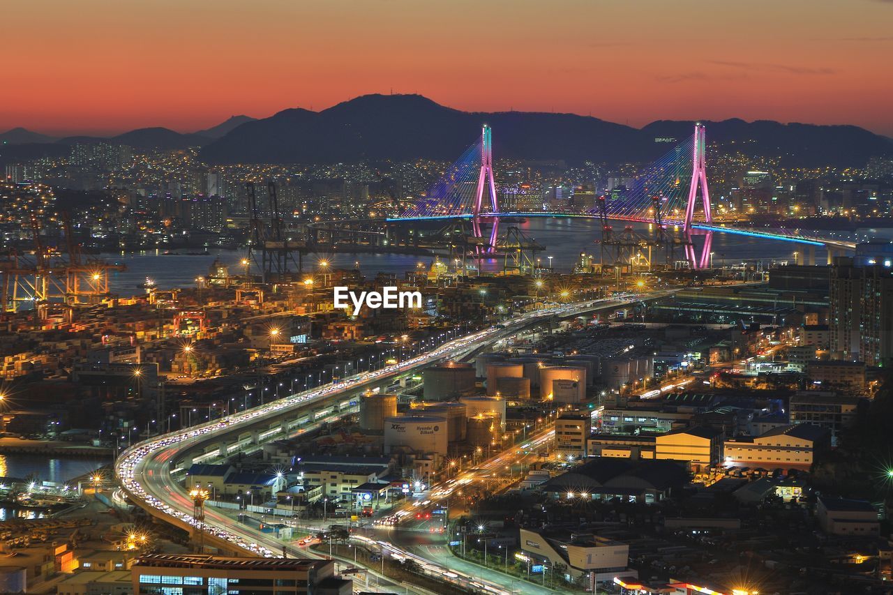High angle view of illuminated city at night