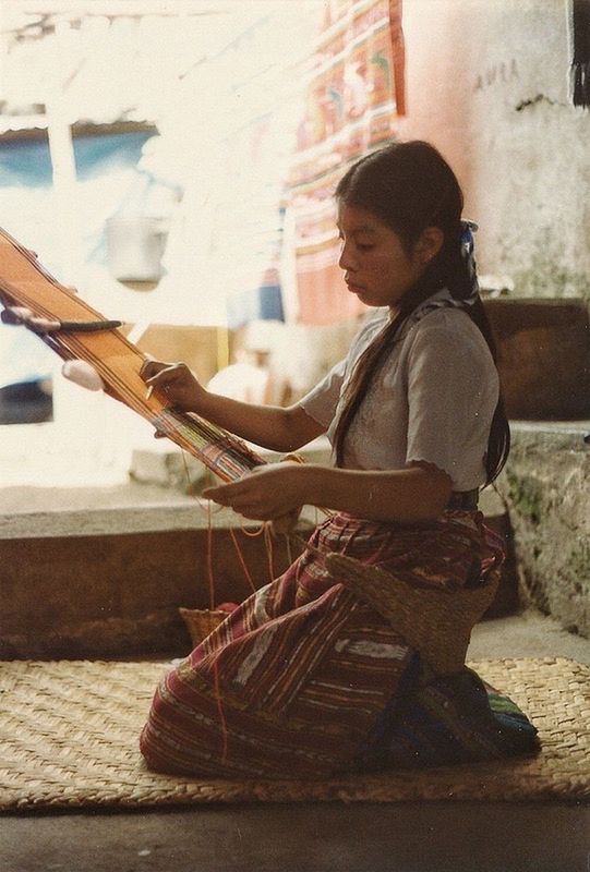 WOMAN SITTING ON BENCH