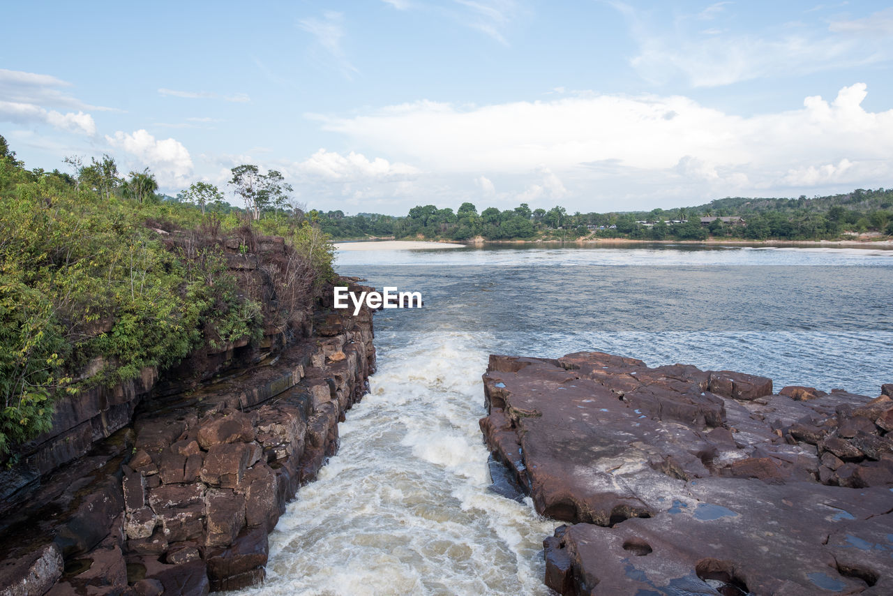 water, body of water, sky, shore, river, coast, nature, land, cloud, environment, scenics - nature, rock, beauty in nature, beach, landscape, travel destinations, travel, tree, cliff, plant, no people, tourism, reservoir, outdoors, bay, tranquility, coastline, architecture, terrain, day, cove, holiday, trip, vacation, tranquil scene, blue, non-urban scene