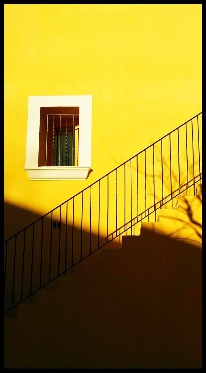 Window on wall by steps