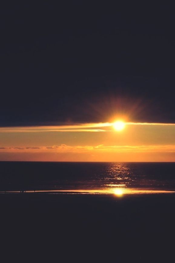 VIEW OF SEA AT SUNSET