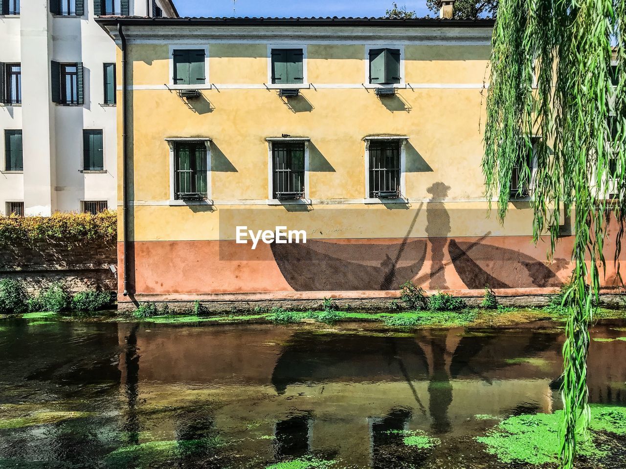 REFLECTION OF BUILDINGS ON WATER