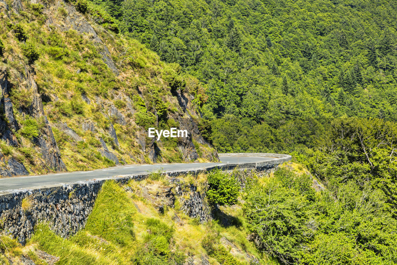 Road climbing to col d'aspin in pyrenees mountains,france