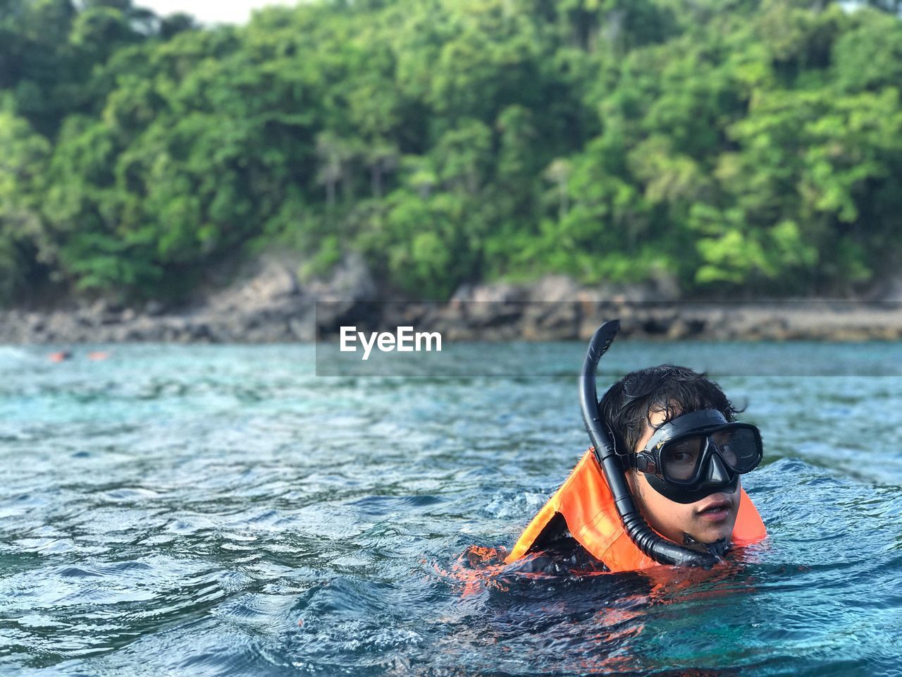 Portrait of young man snorkeling in sea