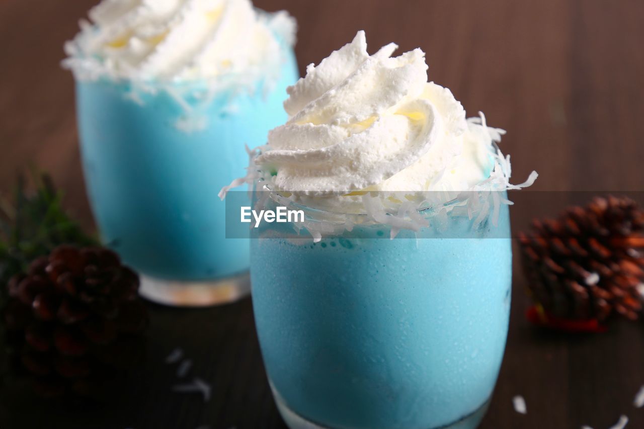 CLOSE-UP OF ICE CREAM IN GLASS