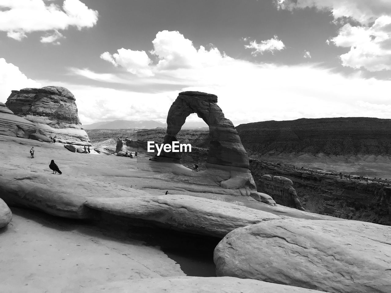ROCK FORMATION ON ROCKS AGAINST SKY