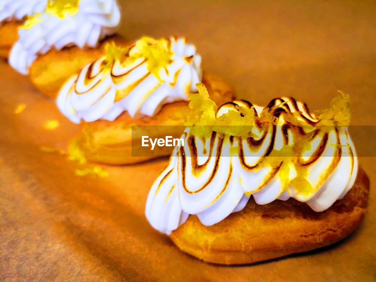 Close-up of eclairs on table