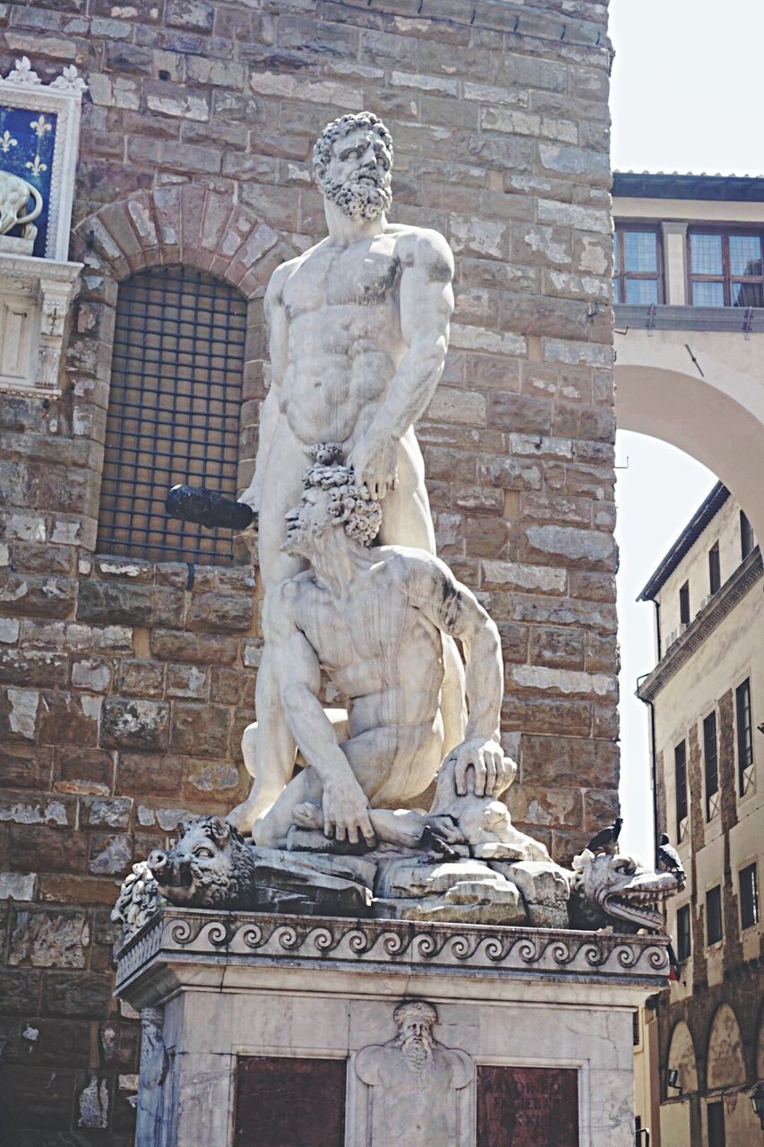 LOW ANGLE VIEW OF STATUES