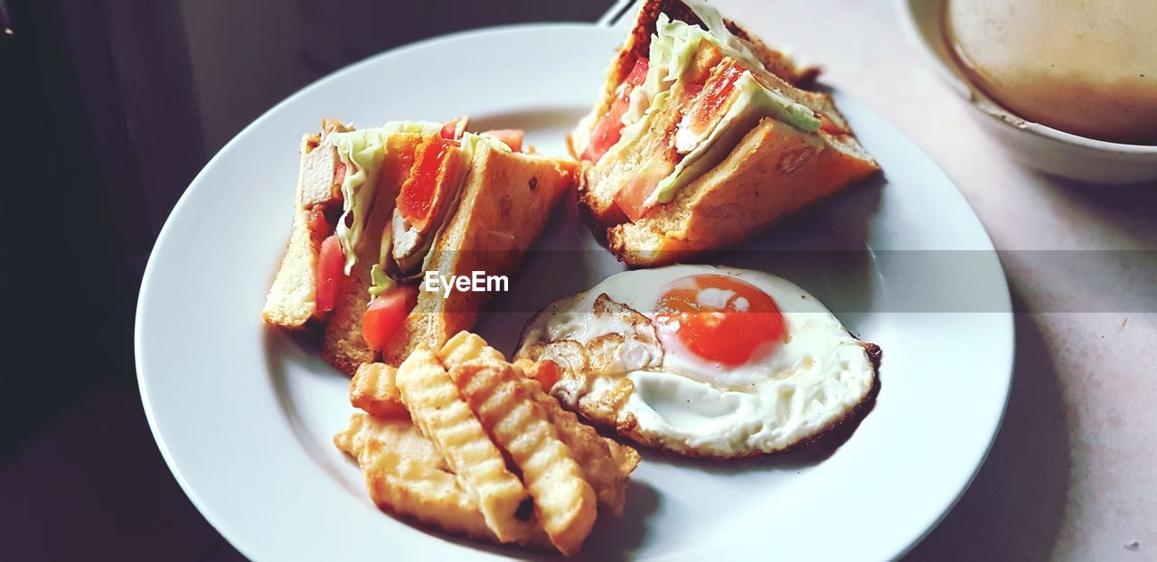 Close-up of breakfast served on plate