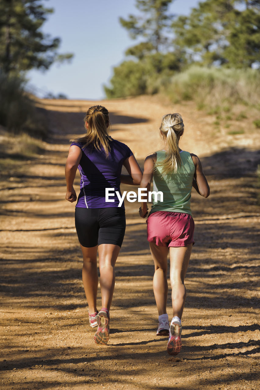 Two women running