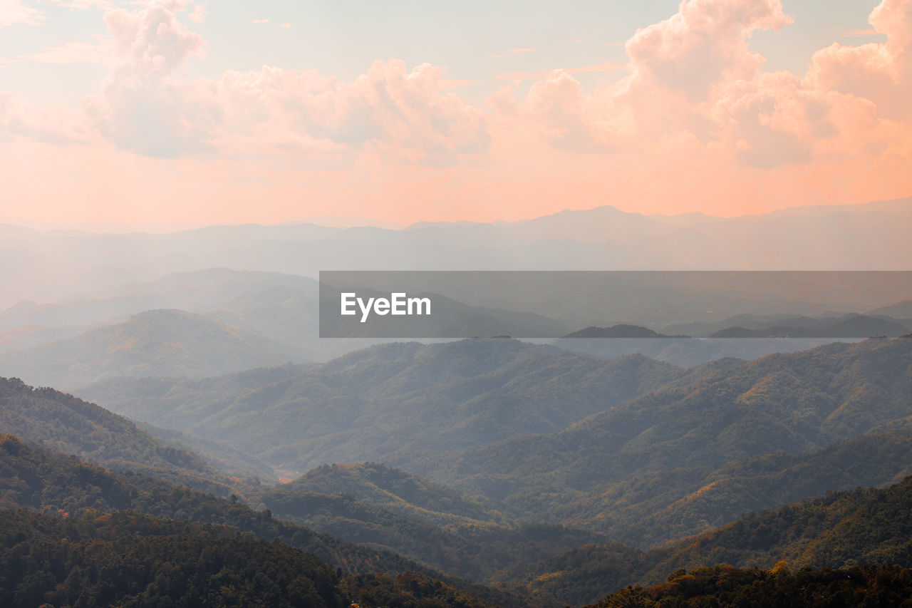 Scenic view of mountains against sky during sunset