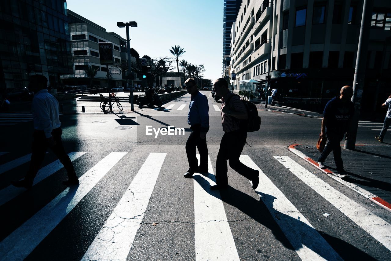 WOMAN WALKING ON STREET