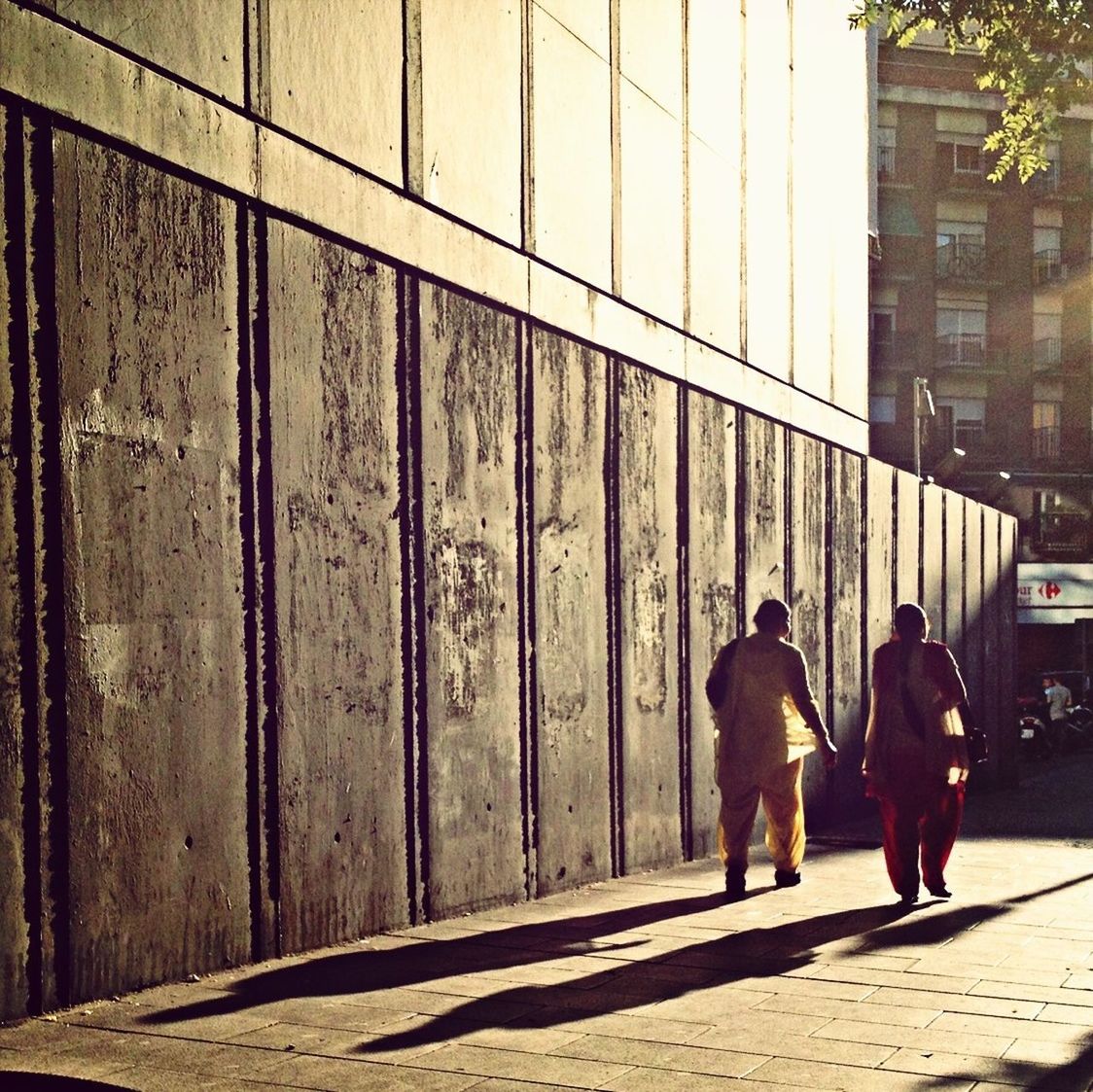 WOMAN WALKING IN CITY