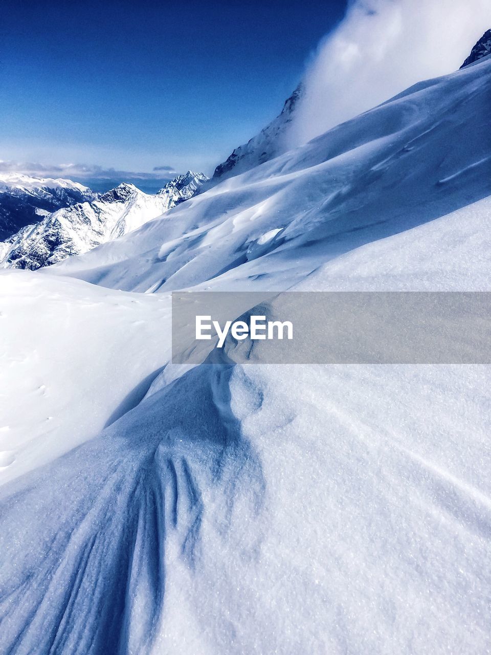 Scenic view of snow covered mountains