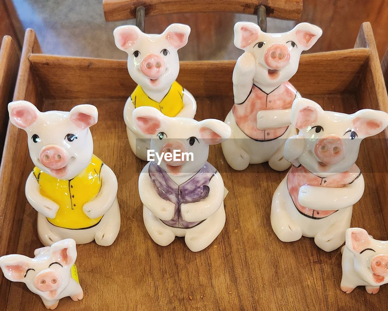 mammal, animal, animal representation, representation, animal themes, domestic animals, pig, cute, indoors, no people, wood, toy, pet, still life, livestock, high angle view, holiday, celebration, group of objects, table, young animal, stuffed toy, cartoon, rabbit