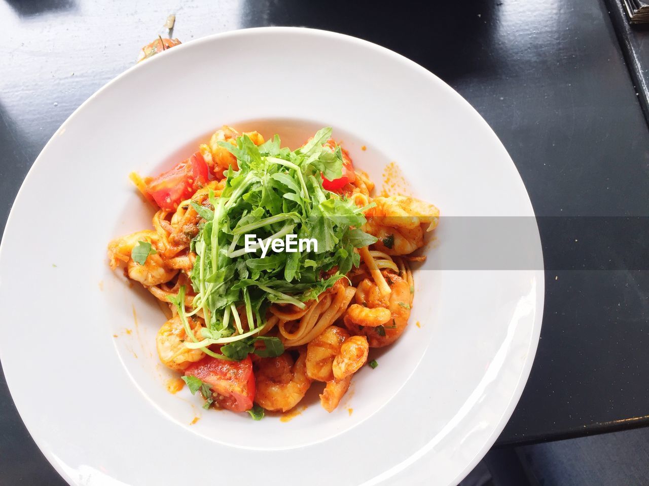 HIGH ANGLE VIEW OF FOOD IN PLATE ON TABLE