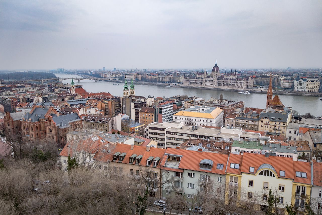 River amidst buildings in city