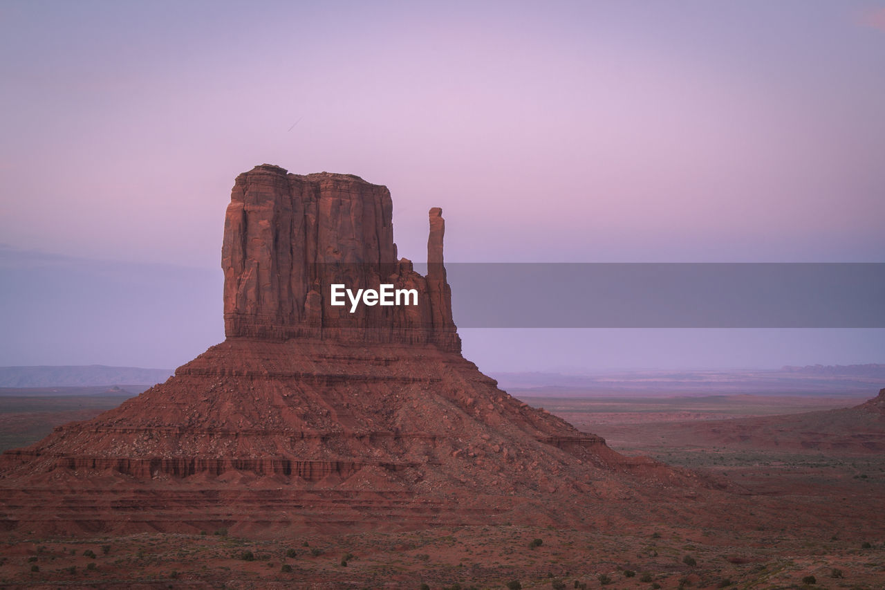 ROCK FORMATIONS ON LANDSCAPE AGAINST SKY