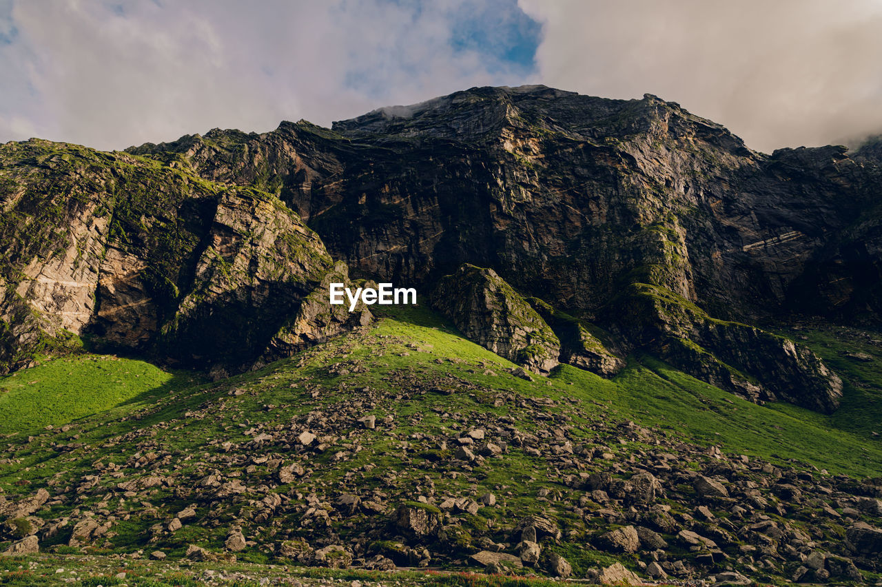 Panoramic view of rocky mountains against sky