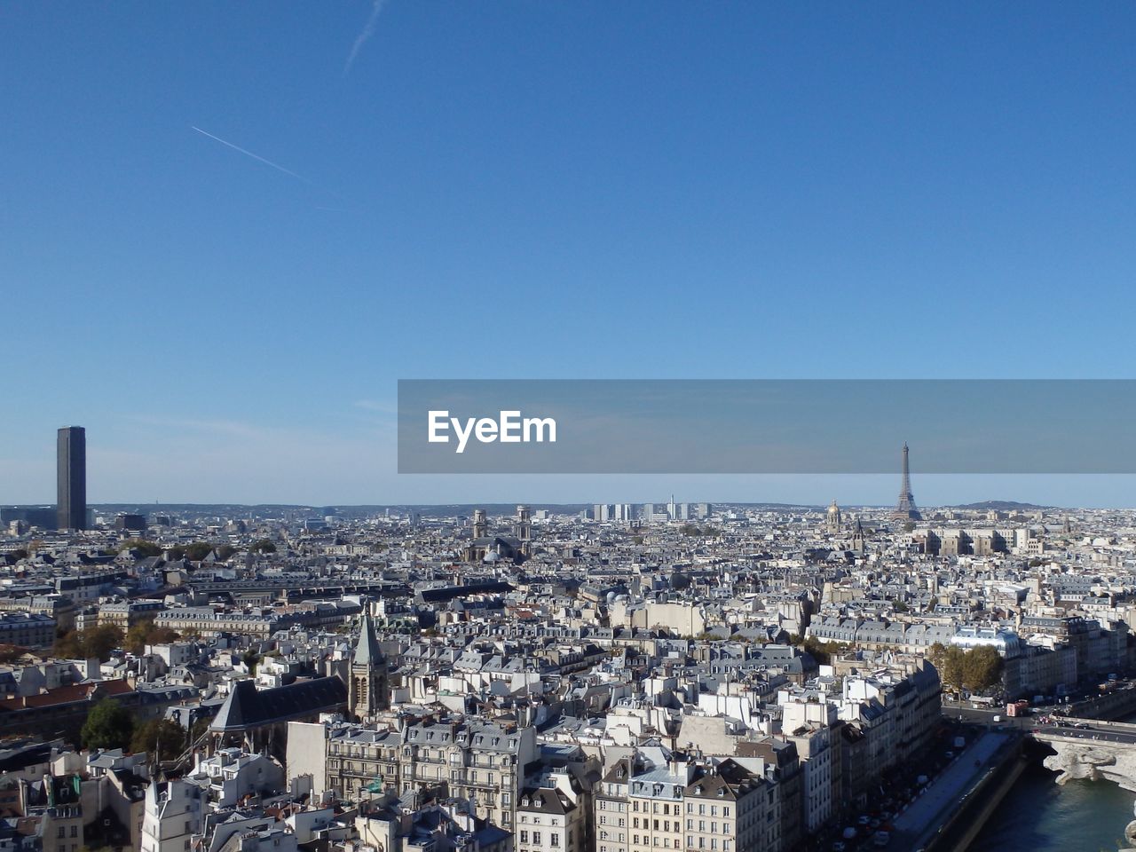 High angle view of paris against blue sky