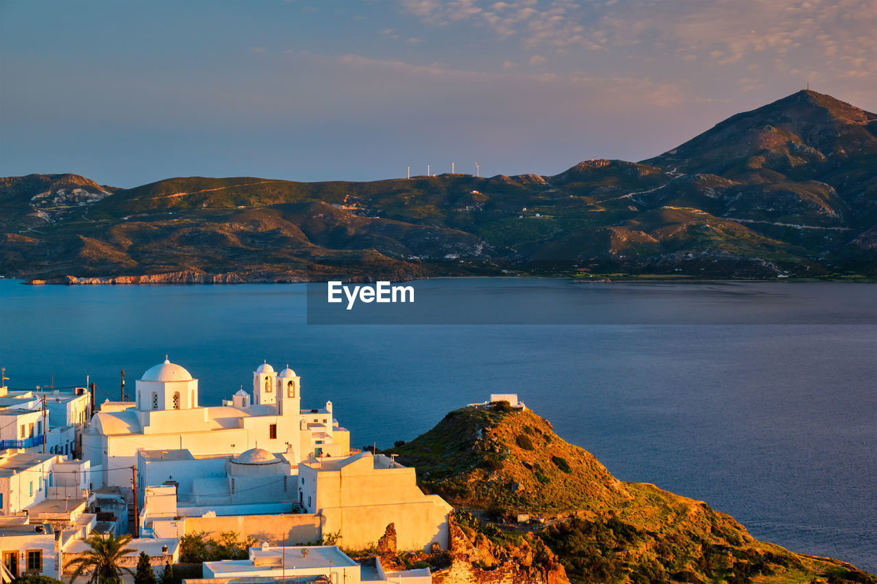 View of plaka village on milos island on sunset in greece