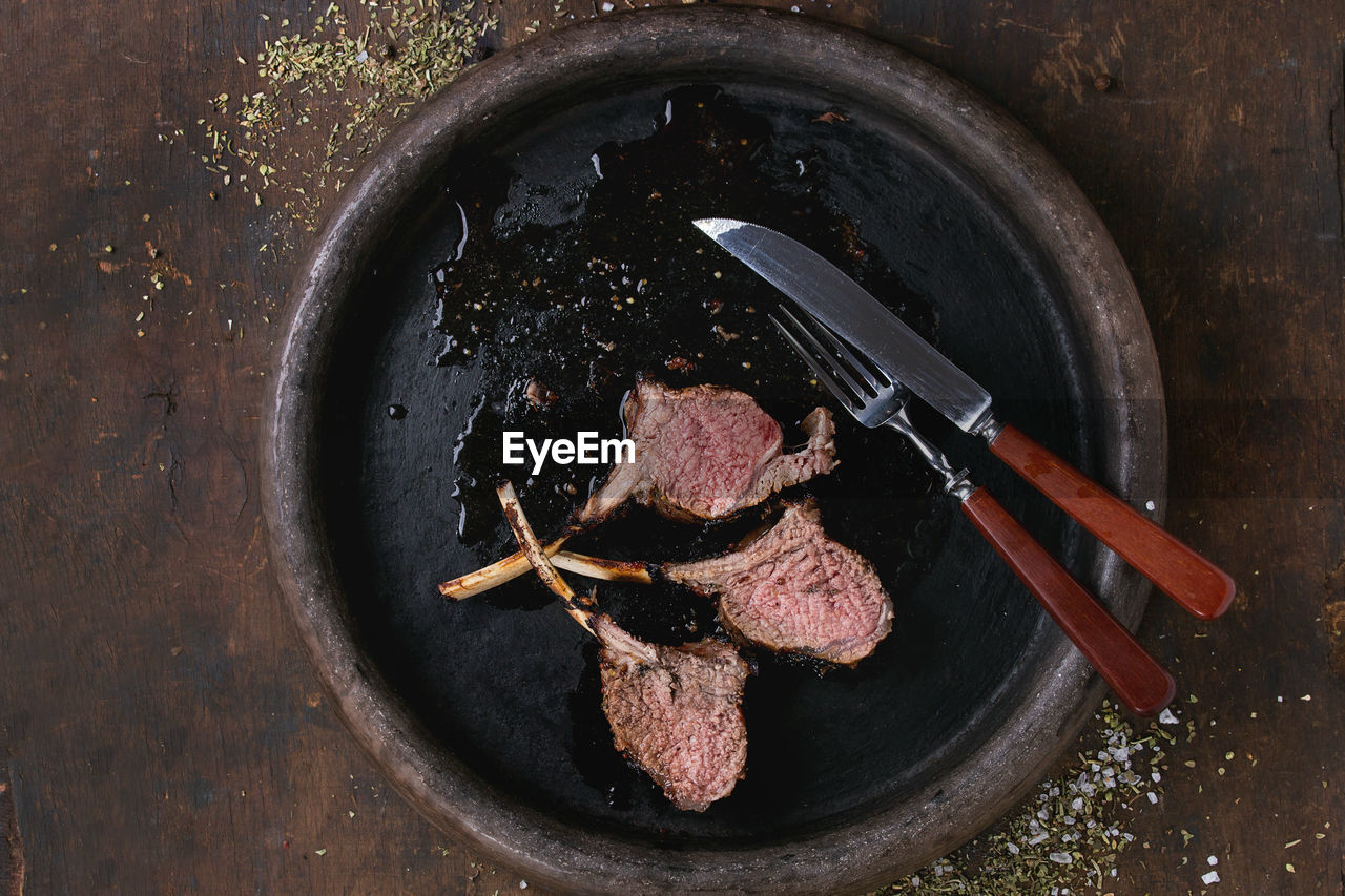High angle view of grilled meat in cooking pan